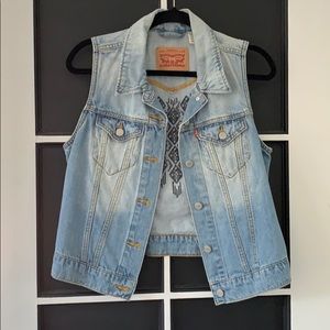 Denim vest with embroidery on back